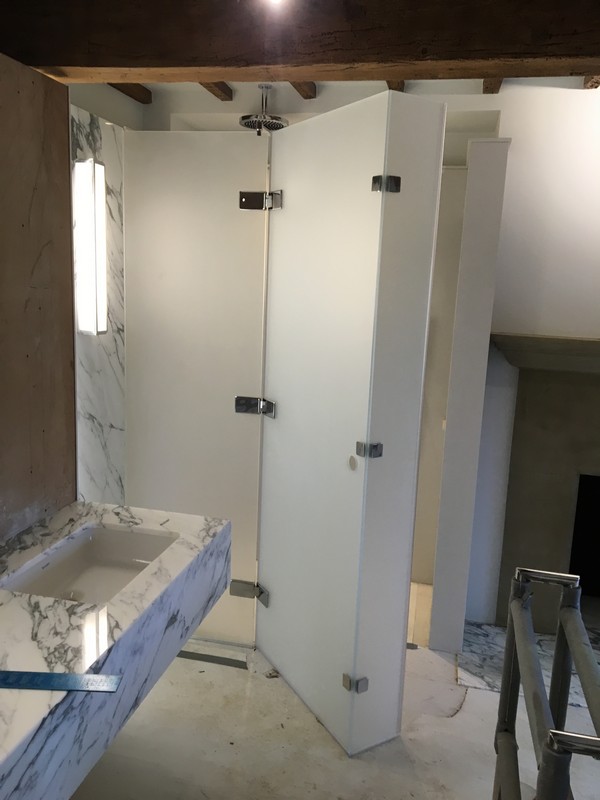 Bespoke frosted glass shower enclosure in Bethnal Green luxury bathroom