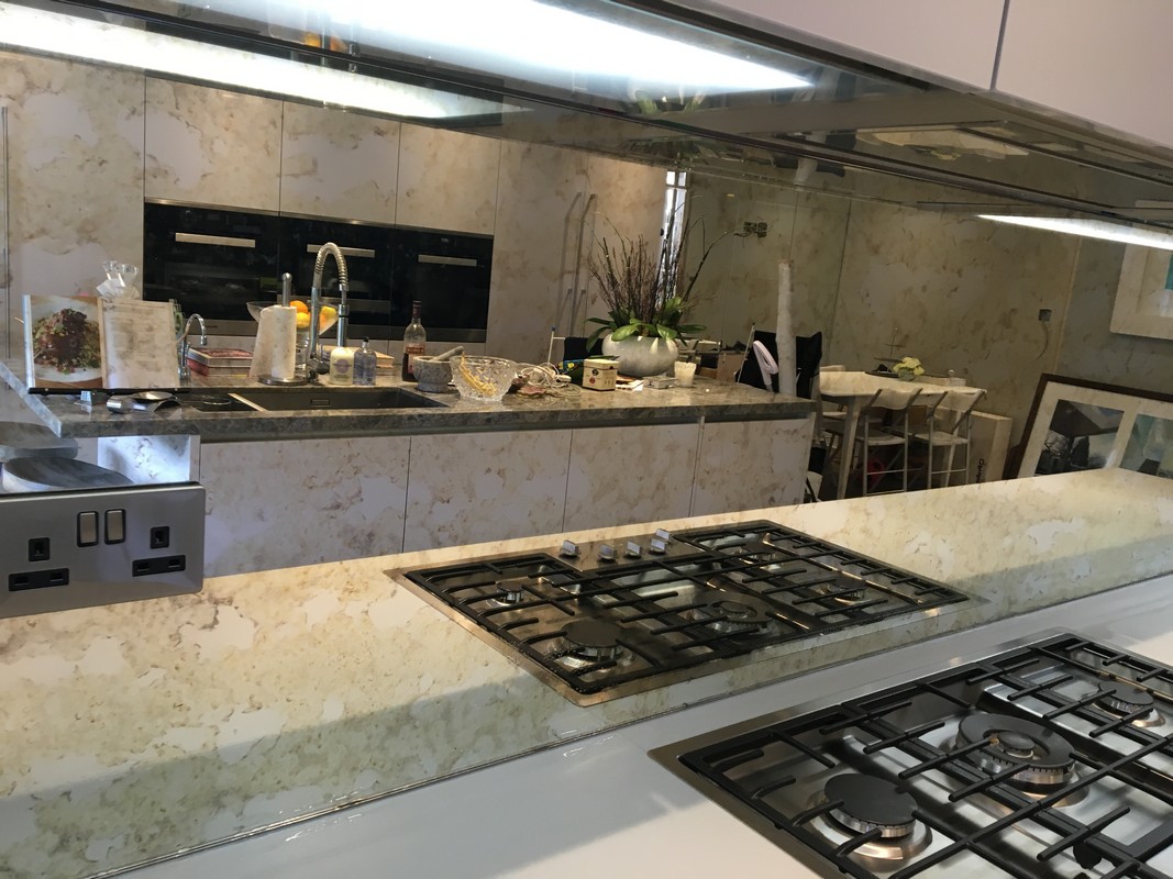 Mirror glass splashback in Bethnal Green luxury kitchen
